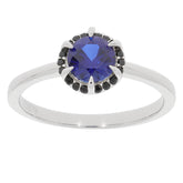 Blue Sapphire sterling silver ring with black accent stones, showcasing a round gemstone in a stunning design.